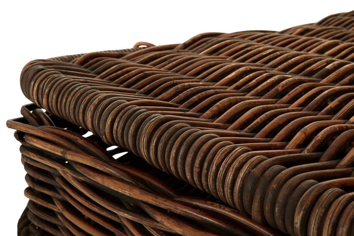 Close up of dark brown wicker basket corner and weaving detail