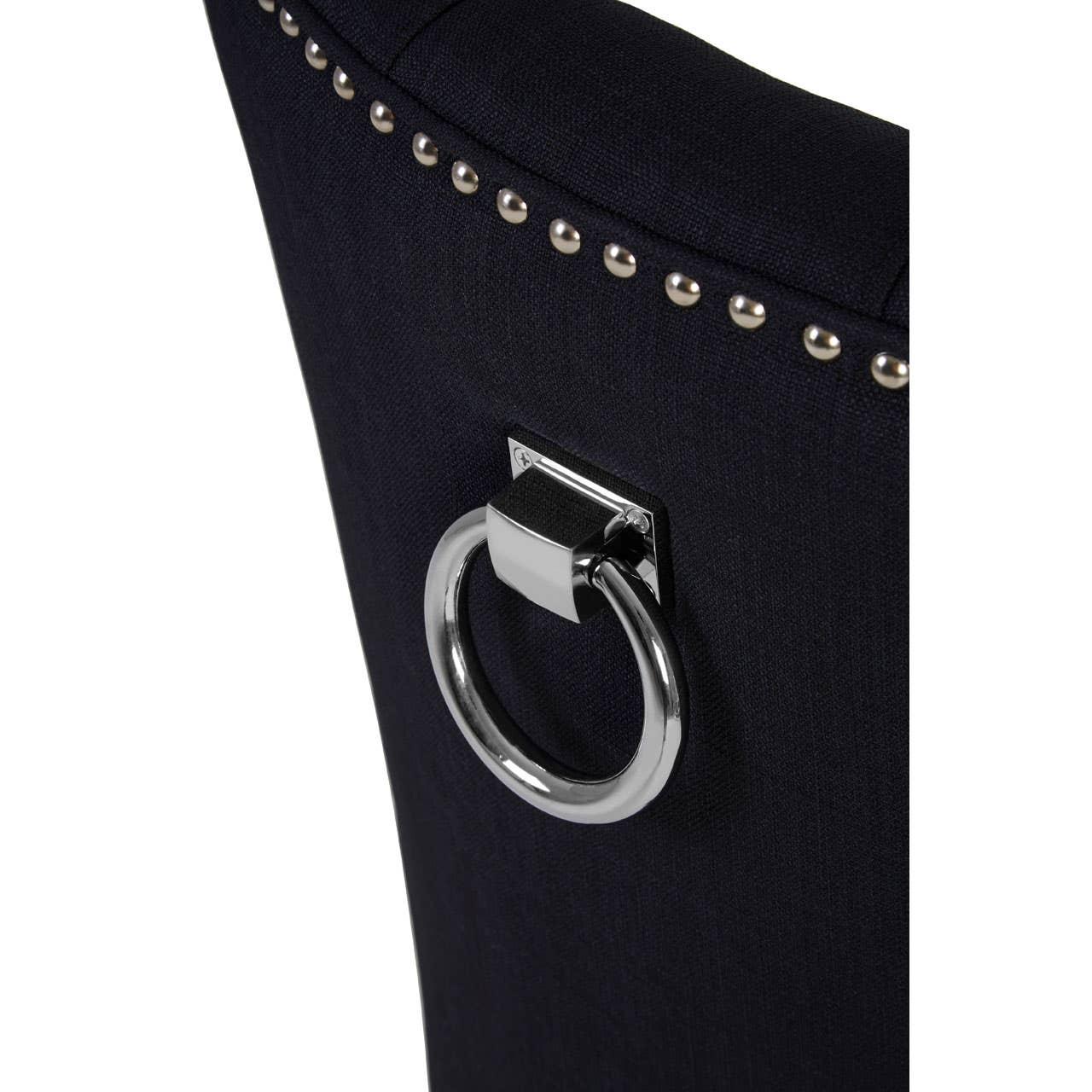Black dining chair back with chrome ring handle and silver stud detail