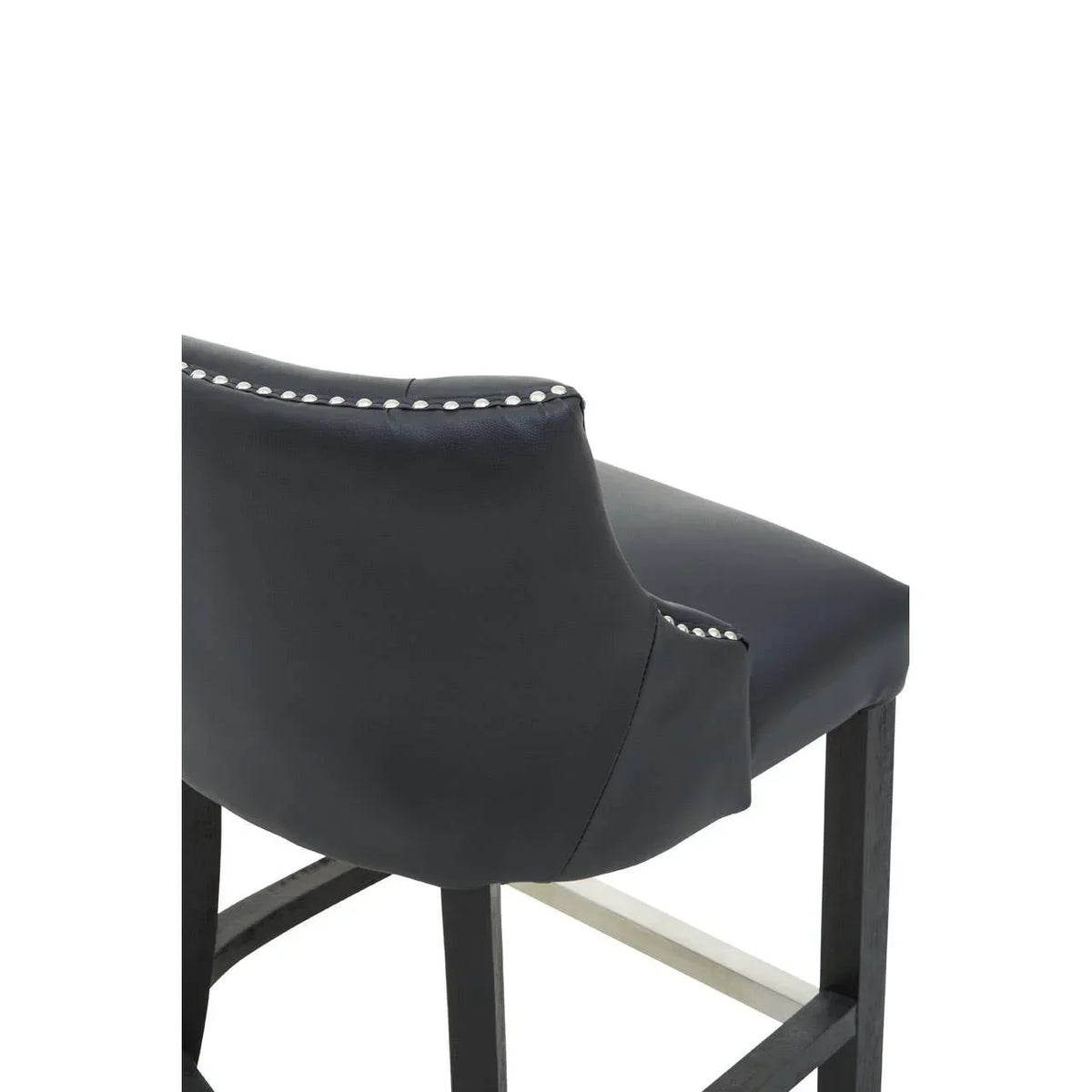 Black leather bar stool with silver stud detailing and wooden legs, rear angle view