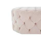 Cream velvet ottoman with deep button tufting, close-up of upholstered corner detail
