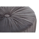 Grey footstool with a tufted design featuring a central button, showcasing soft fabric and a rectangular shape