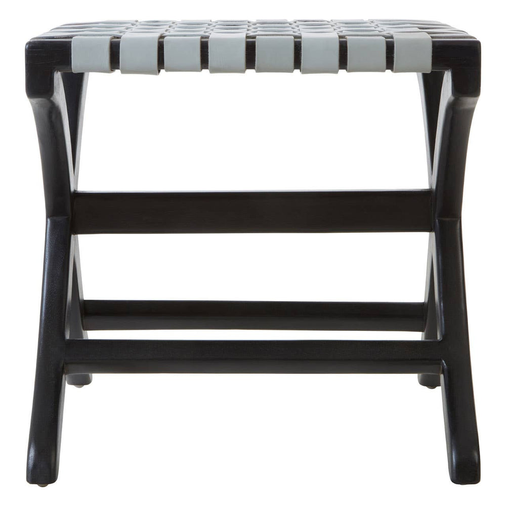 A grey leather stool with a woven seat design, supported by a sturdy black teak frame. The stool features a rectangular shape with a slatted top and crossbar support, showcasing a modern and minimalist aesthetic