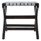 A grey leather stool with a woven seat design, supported by a sturdy black teak frame. The stool features a rectangular shape with a slatted top and crossbar support, showcasing a modern and minimalist aesthetic