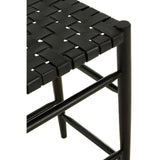 Black woven leather barstool featuring a textured seat made of interlaced leather strips, supported by a sturdy black metal frame with a minimalist design. The barstool has a sleek, modern aesthetic suitable for various home decor styles