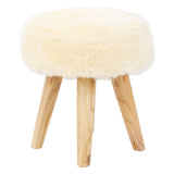 Cream faux fur stool with a round top and four natural teak wood legs, showcasing a soft texture and a minimalist design
