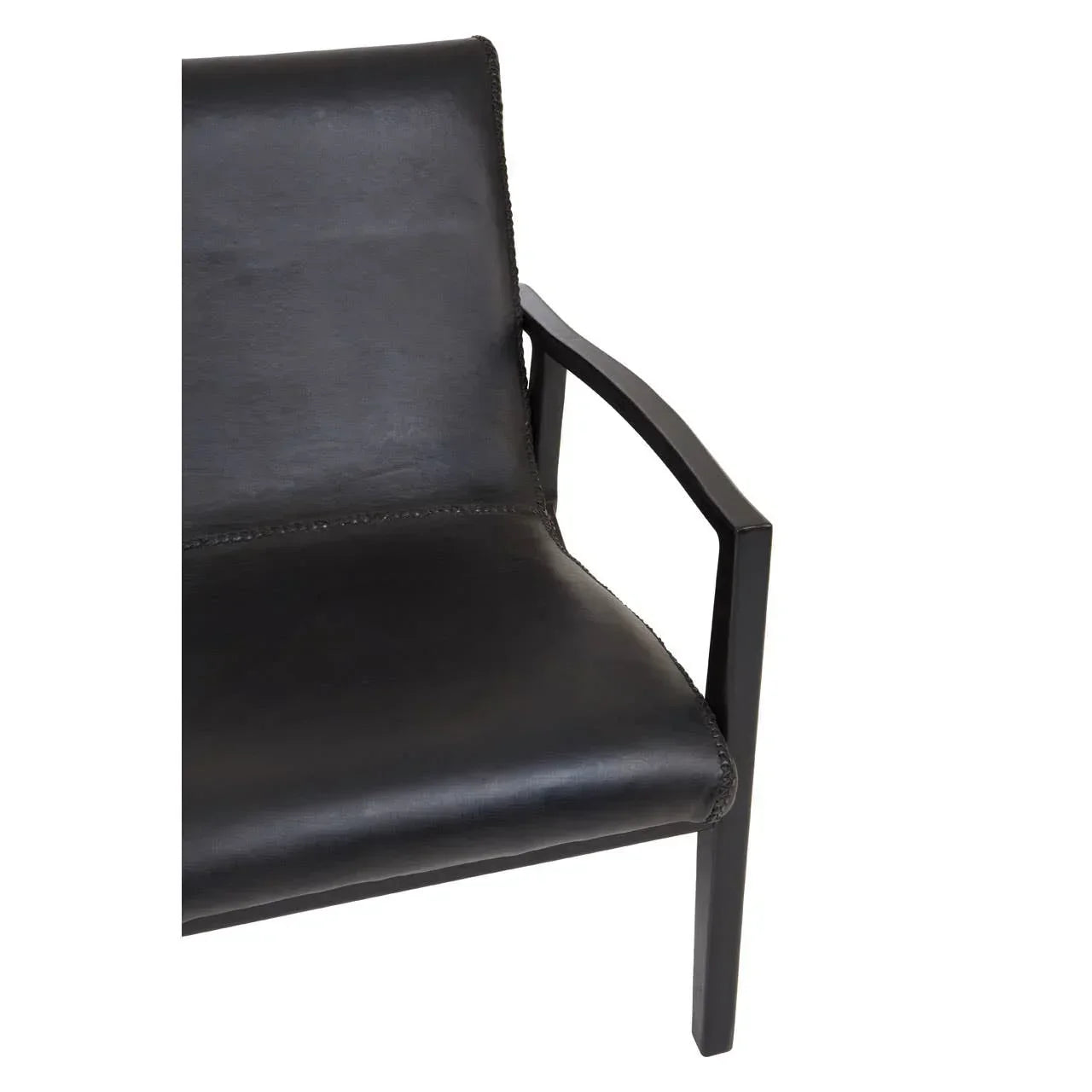 Black leather armchair with metal frame, close-up of seat and armrest