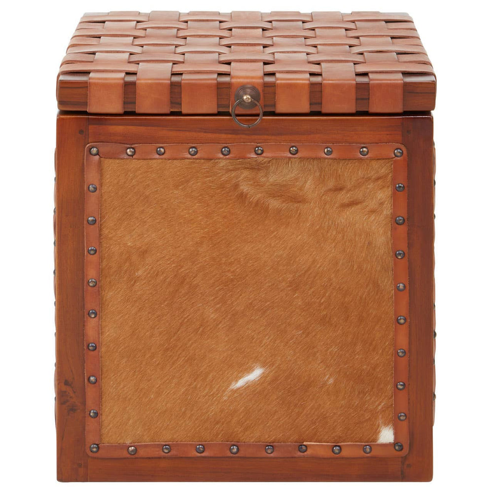Kendari Hair on Leather Storage Stool featuring a square design with a textured, patterned top and a smooth, tan leather front panel. The stool has a warm brown color with subtle variations and a decorative border