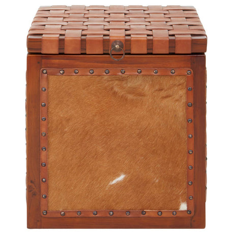 Kendari Hair on Leather Storage Stool featuring a square design with a textured, patterned top and a smooth, tan leather front panel. The stool has a warm brown color with subtle variations and a decorative border