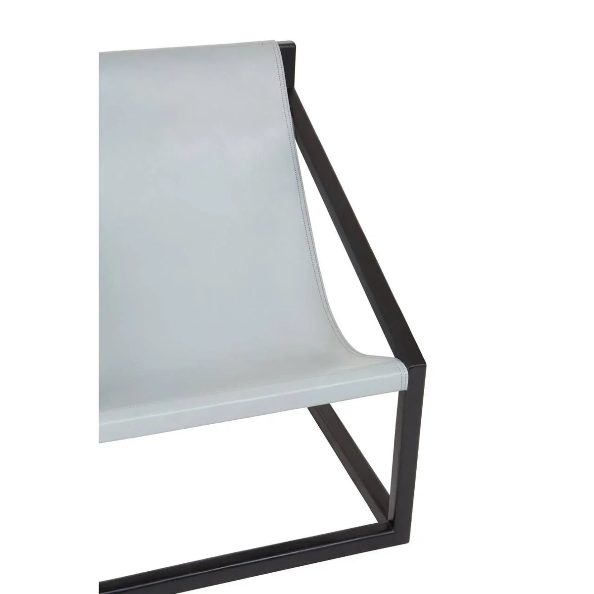 Modern accent chair with white leather seat and black metal frame, side angle view