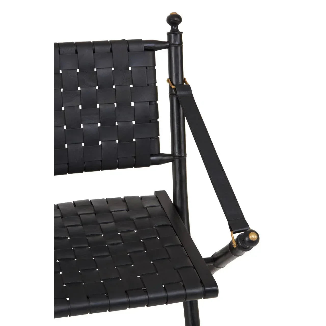 Close view of black woven leather dining chair seat and backrest with frame detail
