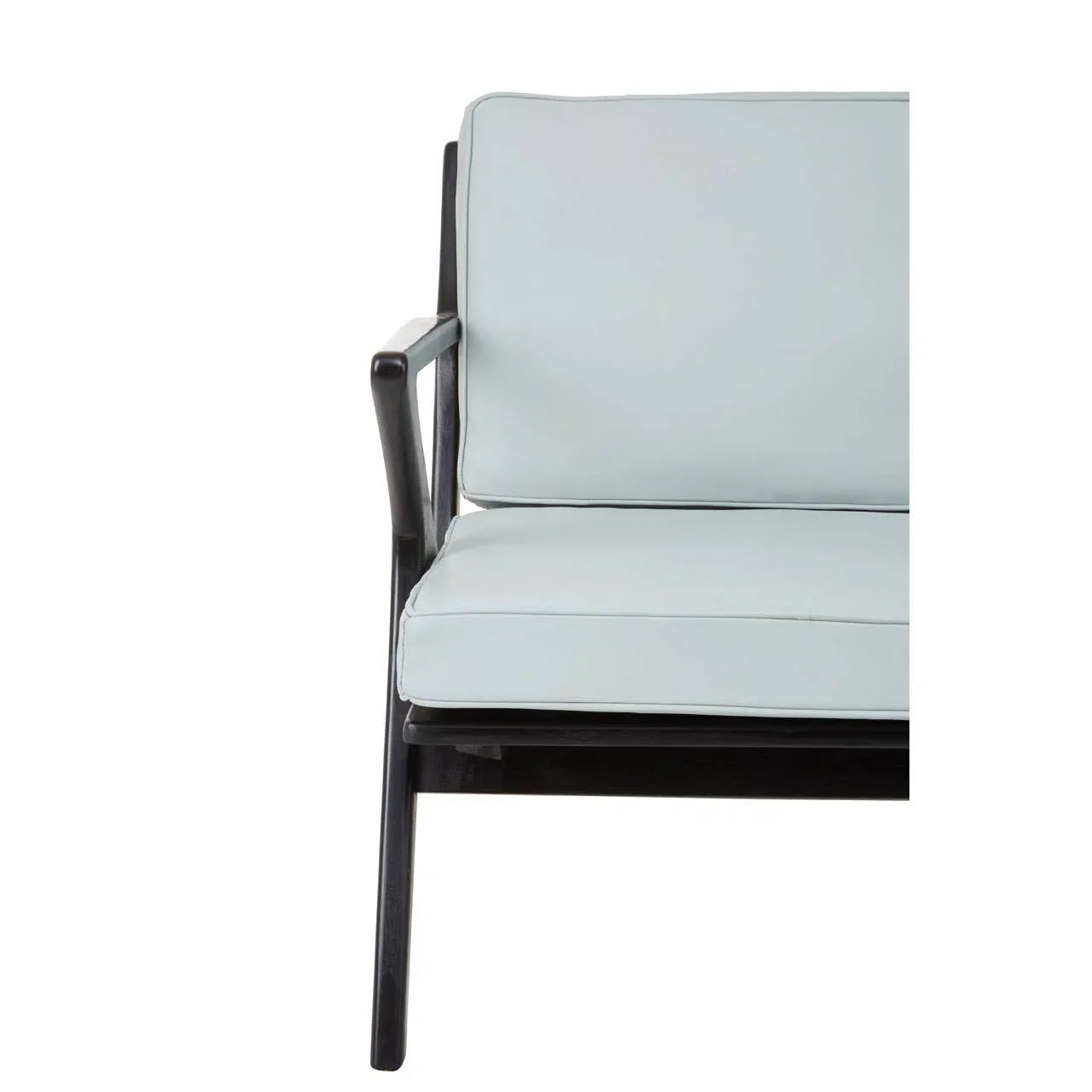 Light grey cushioned armchair with black wooden frame, cropped side view