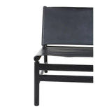Black leather accent chair with minimalist metal frame, close side view