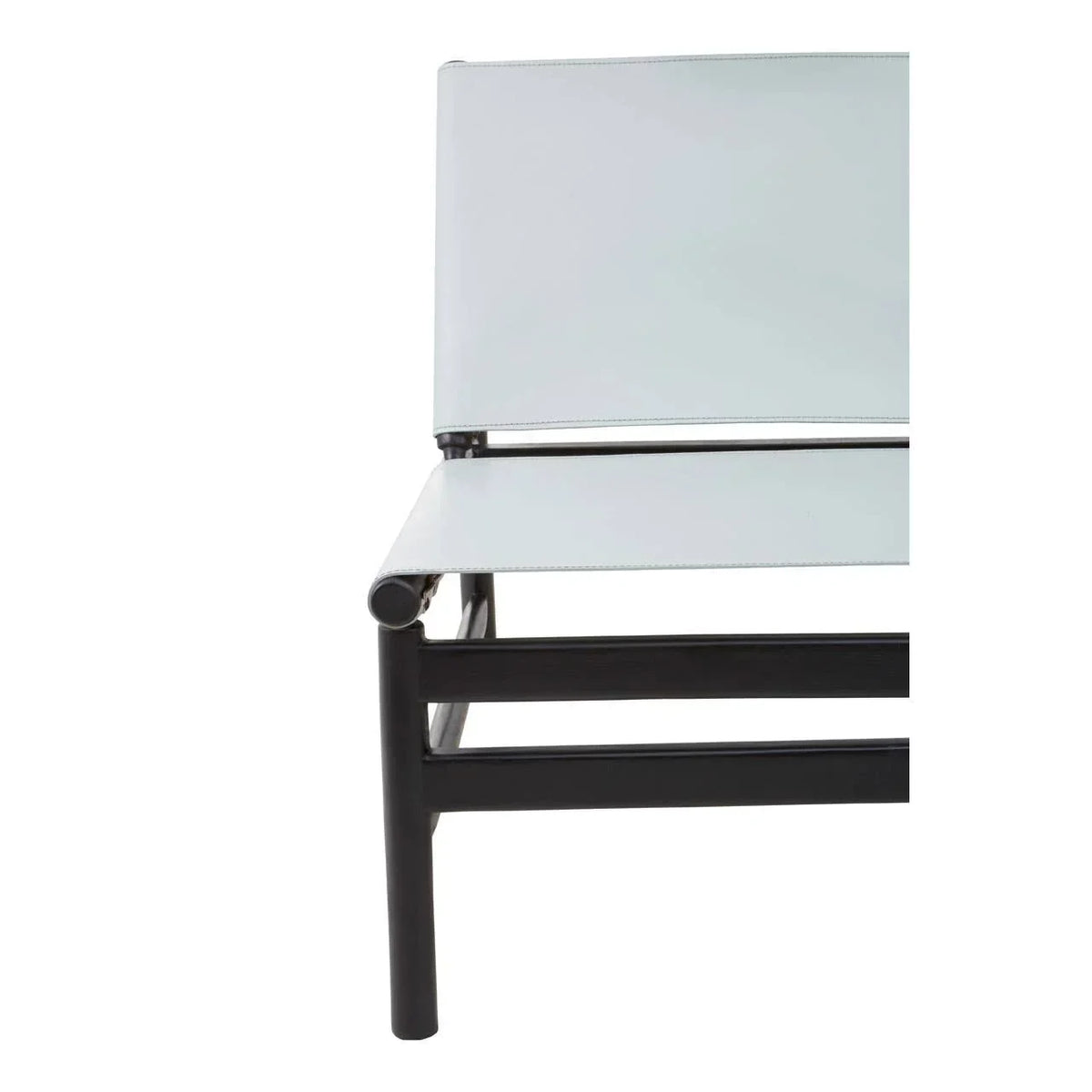 Modern outdoor chair with white sling seat and black metal frame, side view