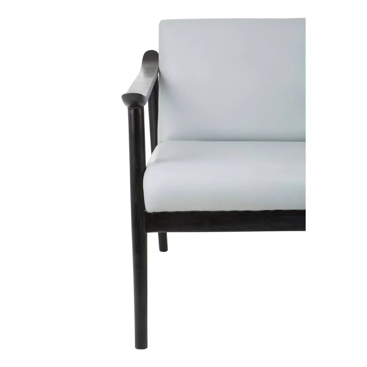 Modern armchair with white upholstery and black wooden frame, partial side view