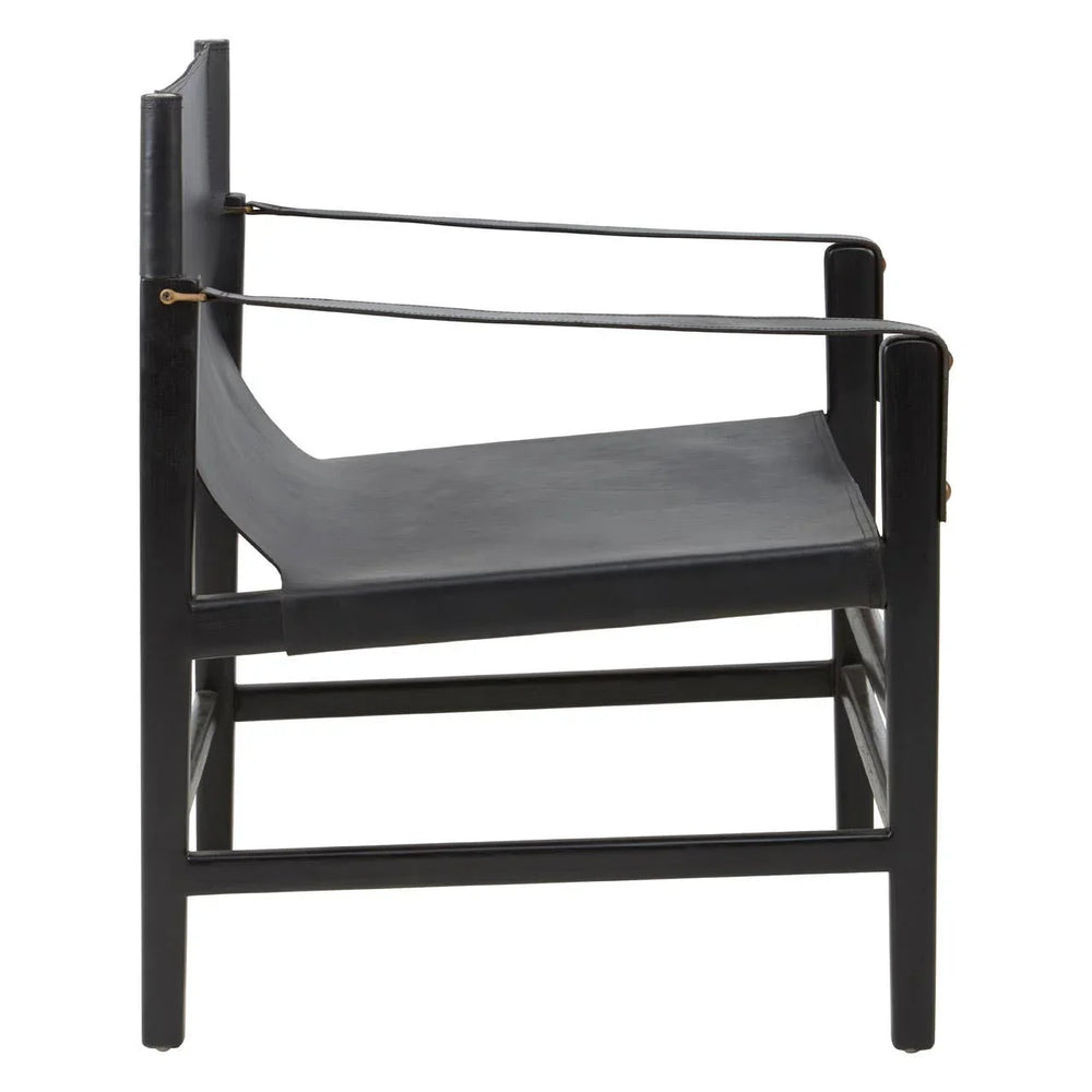 Black leather lounge chair with minimalist wooden frame and narrow armrests, side view