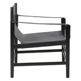 Black leather lounge chair with minimalist wooden frame and narrow armrests, side view