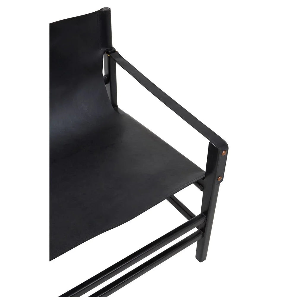 Black leather accent chair with armrests and minimalist metal frame