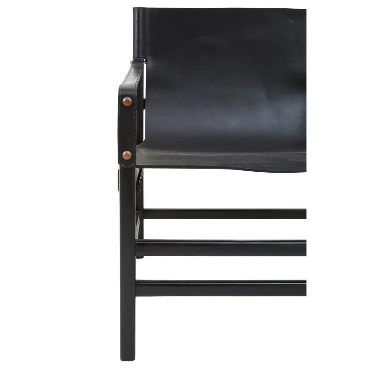 Black leather dining chair with armrest and visible rivet details, partial side view