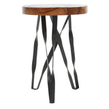 Round teak wood stool featuring intricate carvings on the top surface, supported by a unique black metal base with twisted legs, creating a modern and artistic design