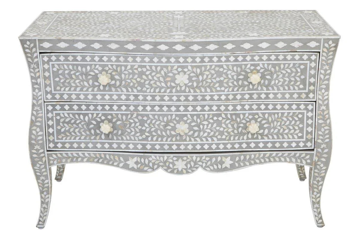 Grey chest of drawers with floral bone inlay pattern and curved legs