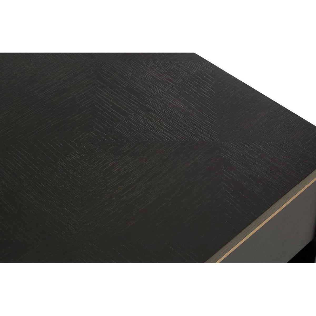 Close up of black wooden coffee table with textured grain pattern and straight edge