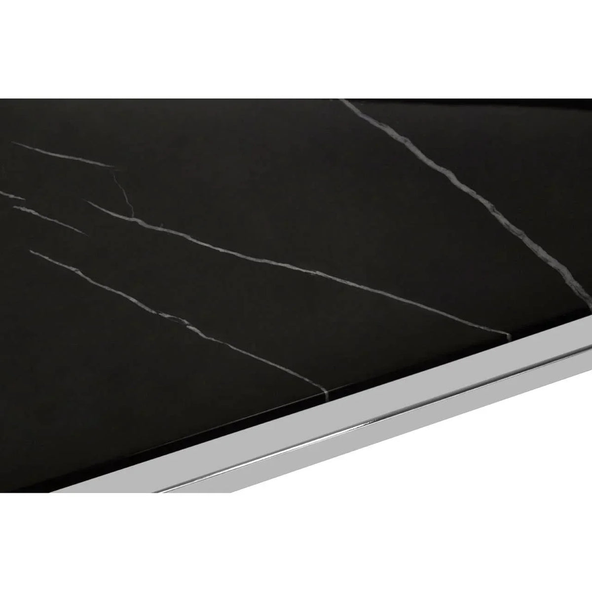 Black marble dining table top with white veining and chrome edge detail