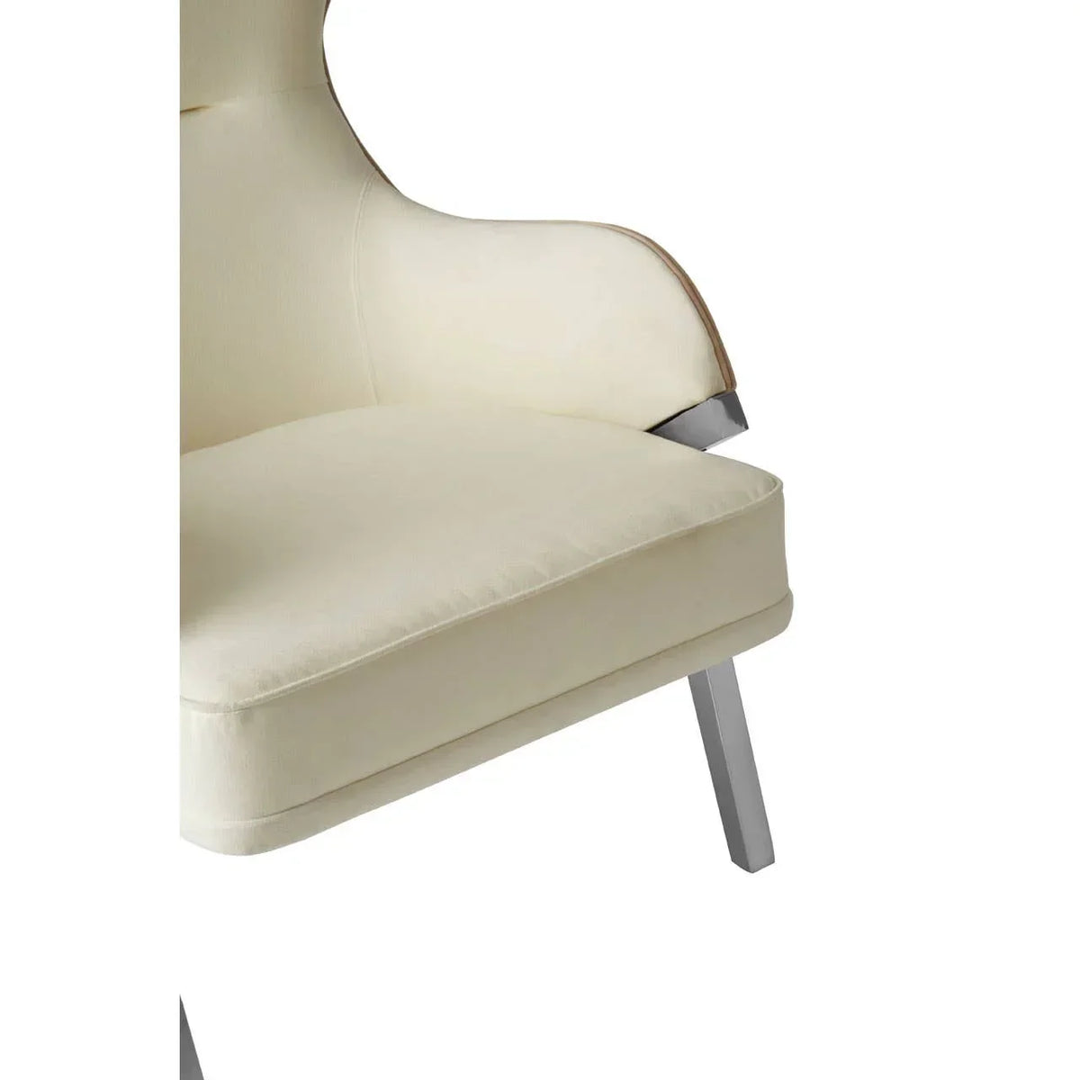 Cream fabric armchair with padded seat and metal angled leg, side detail view