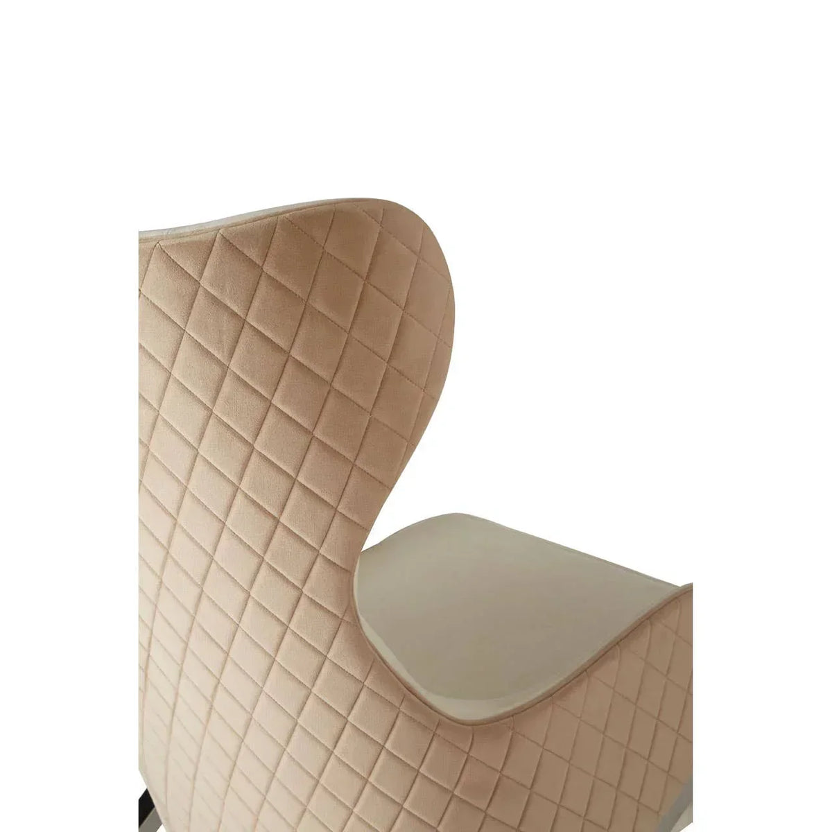 Tan velvet accent chair with diamond stitched backrest, rear angle view
