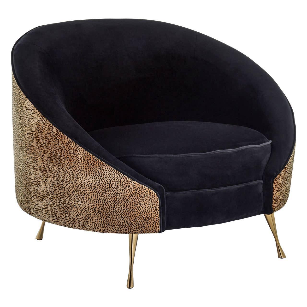 Black velvet accent chair with gold textured sides and slim gold metal legs