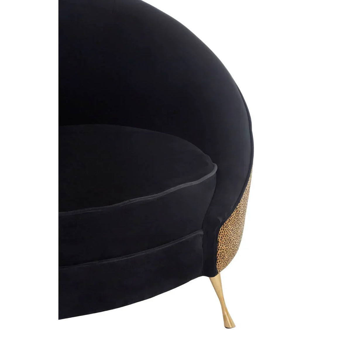 Black velvet armchair with gold metal leg and rattan side accent