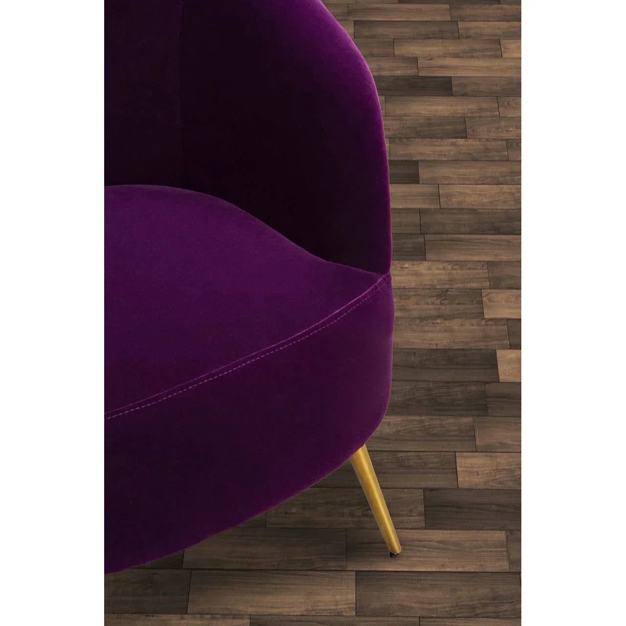 Purple velvet accent chair with gold metal leg on wood flooring