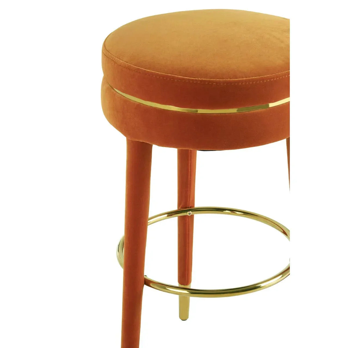 Orange velvet bar stool with gold metal footrest and legs, partial side view