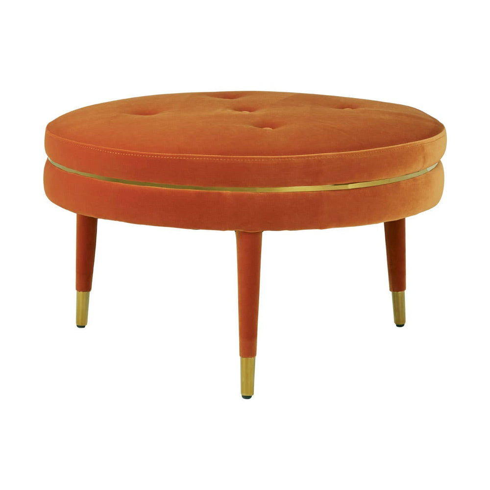 Round footstool upholstered in vibrant orange velvet with a tufted top, featuring tapered wooden legs and gold accents at the base