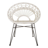 A white natural rattan chair with a circular backrest featuring a fan-like design, supported by slender black metal legs. The chair has a minimalist and modern aesthetic, suitable for various home decor styles