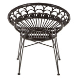 A round black rattan chair with a natural finish, featuring a woven design and slender metal legs, showcasing a modern and stylish look suitable for home decor