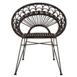 A black natural rattan chair with a rounded backrest featuring a fan-like design, supported by slender metal legs. The chair has a woven texture and a minimalist style, suitable for indoor or outdoor use