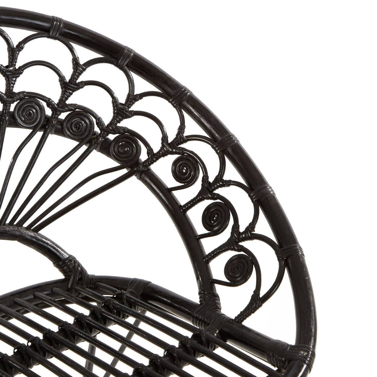 Black natural rattan chair featuring a curved backrest with intricate scrollwork and a slatted seat design, showcasing a blend of elegance and comfort