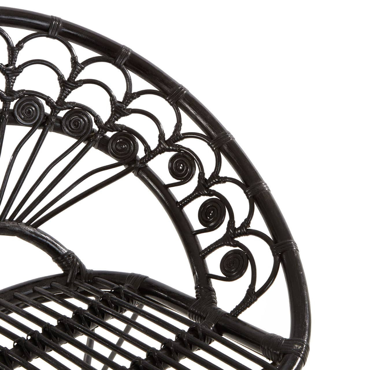 Black natural rattan chair featuring a curved backrest with intricate scrollwork and a slatted seat design, showcasing a blend of elegance and comfort