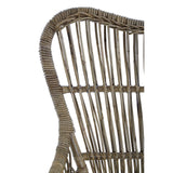 Natural rattan chair featuring a curved backrest with vertical slats, showcasing a light brown finish and a woven texture. The chair has a sturdy base and a minimalist design, suitable for various home decor styles