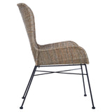 Curved design natural rattan chair with a light brown woven seat and backrest, supported by slender black metal legs. The chair features a smooth silhouette and a comfortable seating area, ideal for home decor