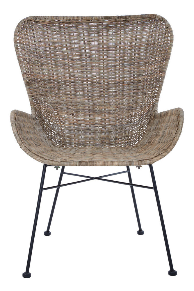 Curved backrest and armrests of a natural rattan chair with a woven texture, supported by a black metal frame and legs, showcasing a modern and stylish design suitable for home decor