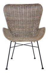 Curved backrest and armrests of a natural rattan chair with a woven texture, supported by a black metal frame and legs, showcasing a modern and stylish design suitable for home decor