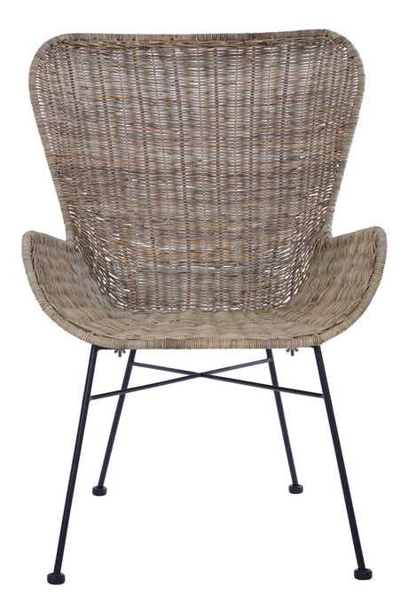 Curved backrest and armrests of a natural rattan chair with a woven texture, supported by a black metal frame and legs, showcasing a modern and stylish design suitable for home decor