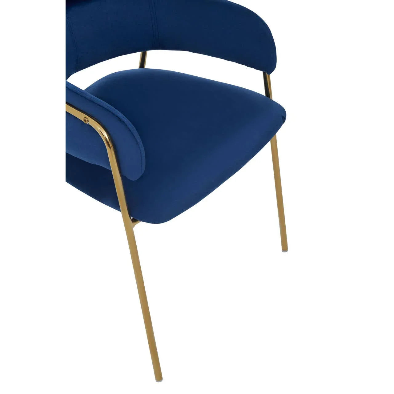 Blue velvet dining chair with curved backrest and gold metal legs, side angle view