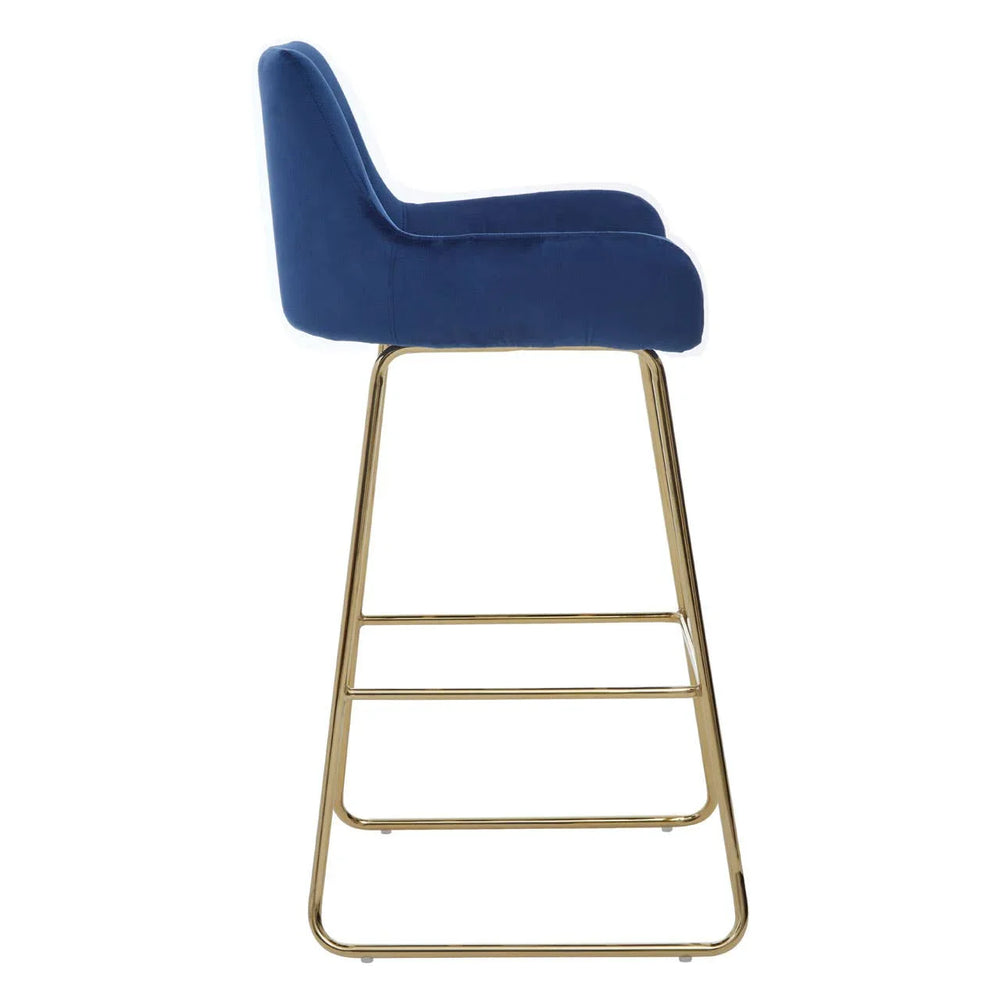 Blue velvet bar stool with gold metal frame, side profile view