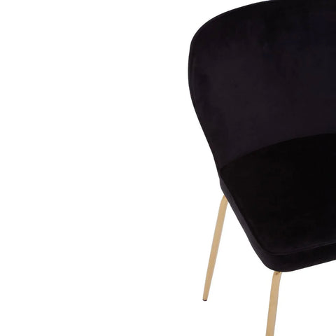 Black velvet dining chair with curved backrest and slim gold legs, angled side view