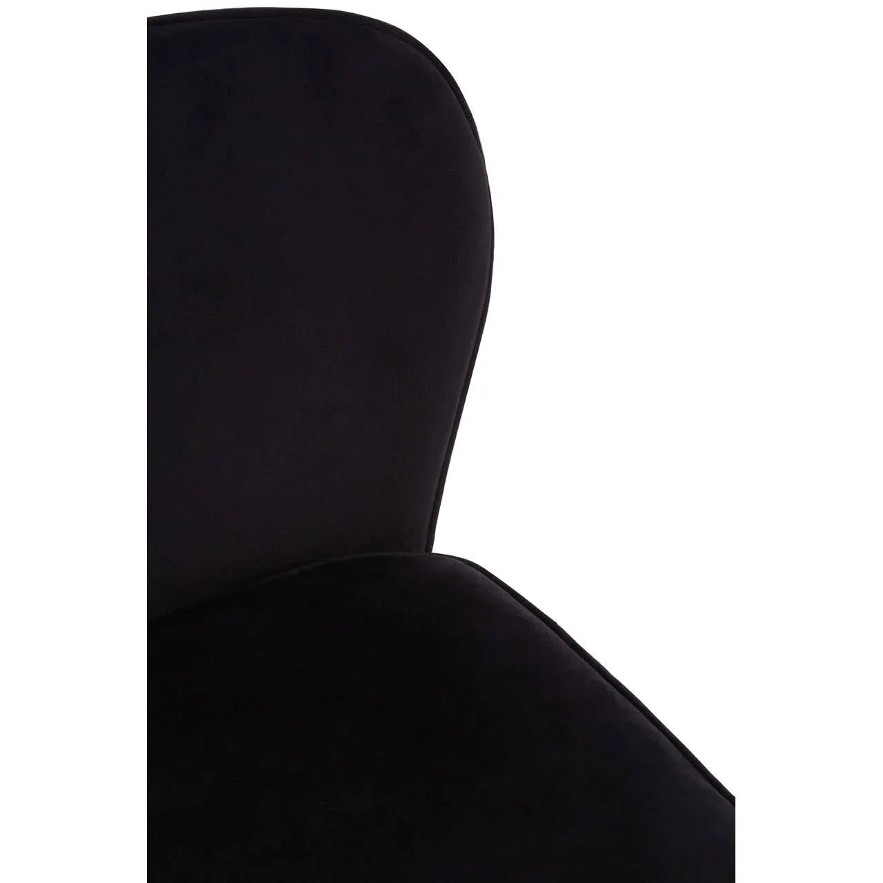 Close-up of black velvet chair backrest and seat upholstery