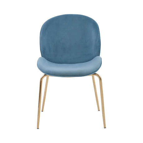 Blue velvet dining chair with curved back and gold metal legs, front view