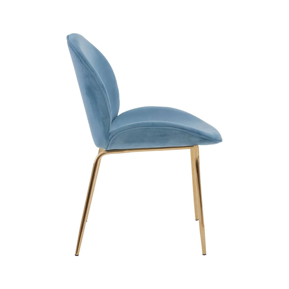 Blue velvet dining chair with gold metal legs shown in side profile view