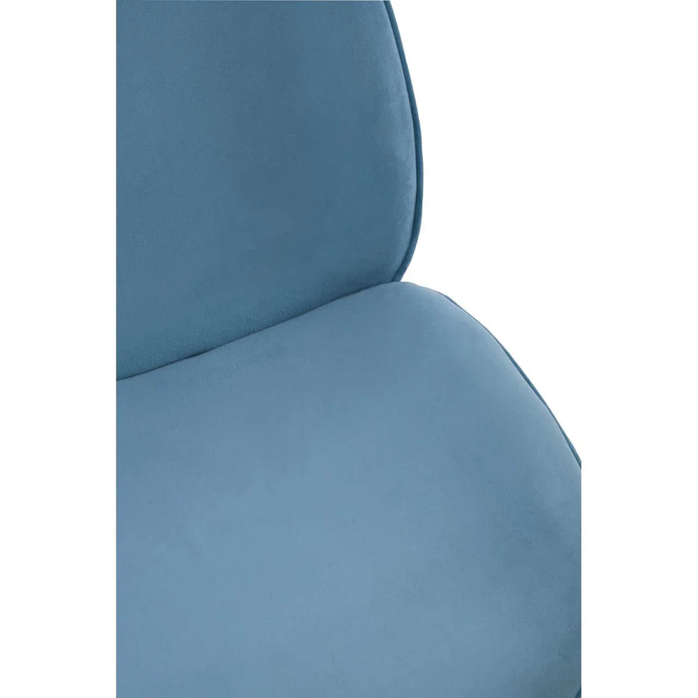 Closeup of blue upholstered chair seat and backrest